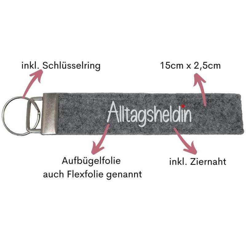 Schlüsselanhänger aus Filz veredelt mit dem Wort "Alltagsheldin", Farbe: hellgrau, inkl. Anhänger und Schlüsselring, Personalisierung möglich, Besonderheiten auf einen Blick