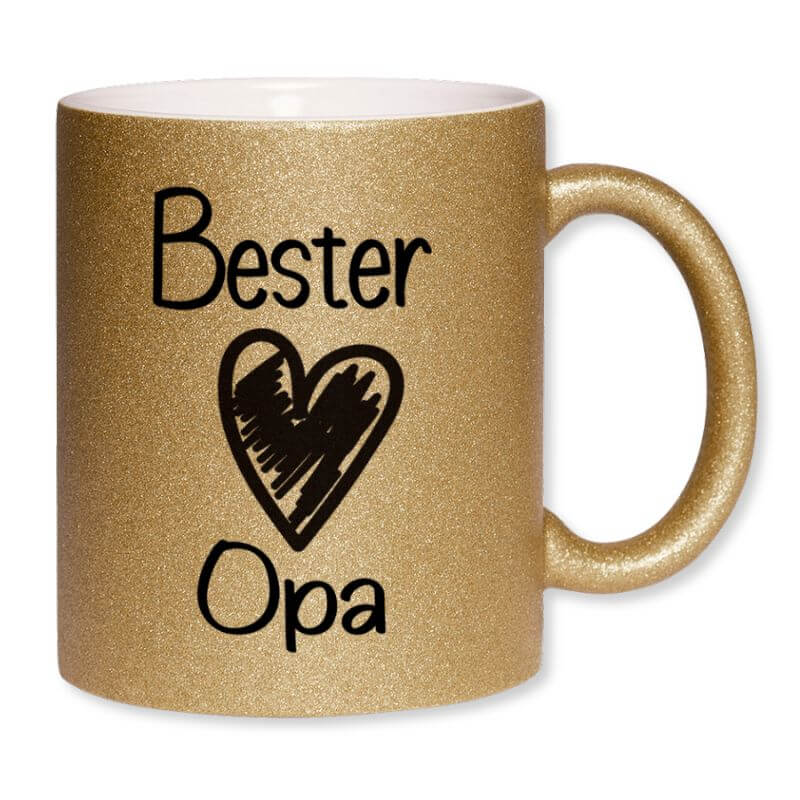 Goldene Glitzertasse mit dem Spruch "Bester Opa" und schwarzem Herzmotiv, glänzende Oberfläche mit Glitzereffekt.