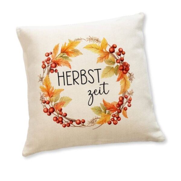 Leinenkissen mit Aufdruck „Herbstzeit“ und herbstlichem Blätterkranz aus roten Beeren und gelben Blättern auf naturfarbener Kissenhülle
